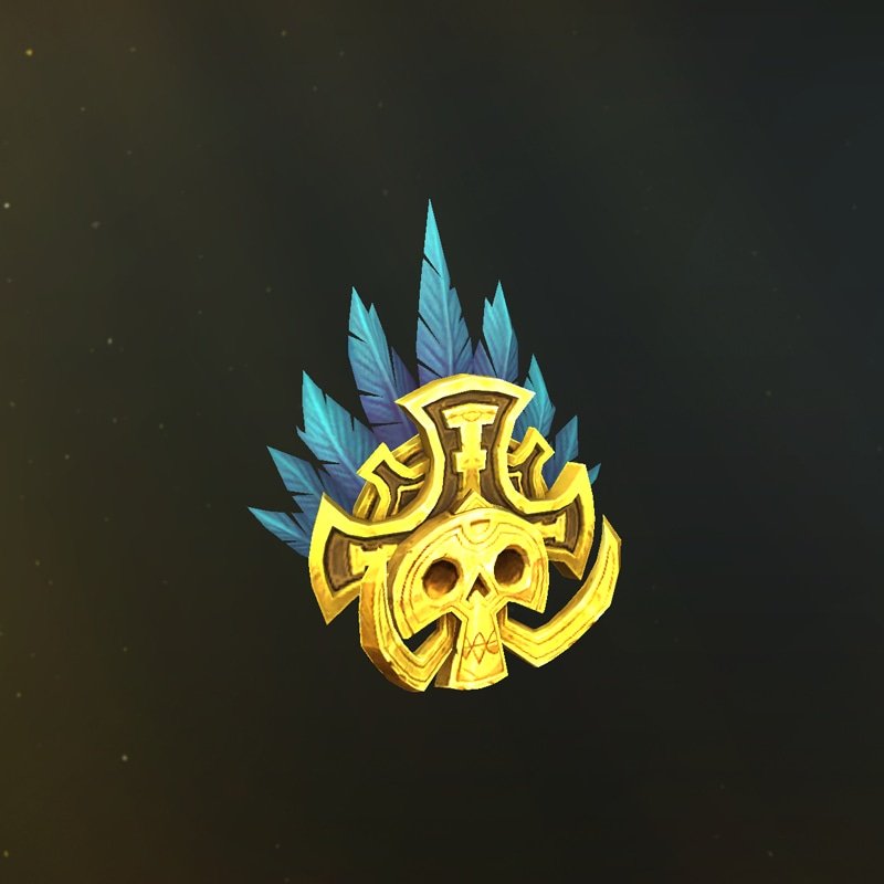 Máscara de calavera dorada con plumas azules