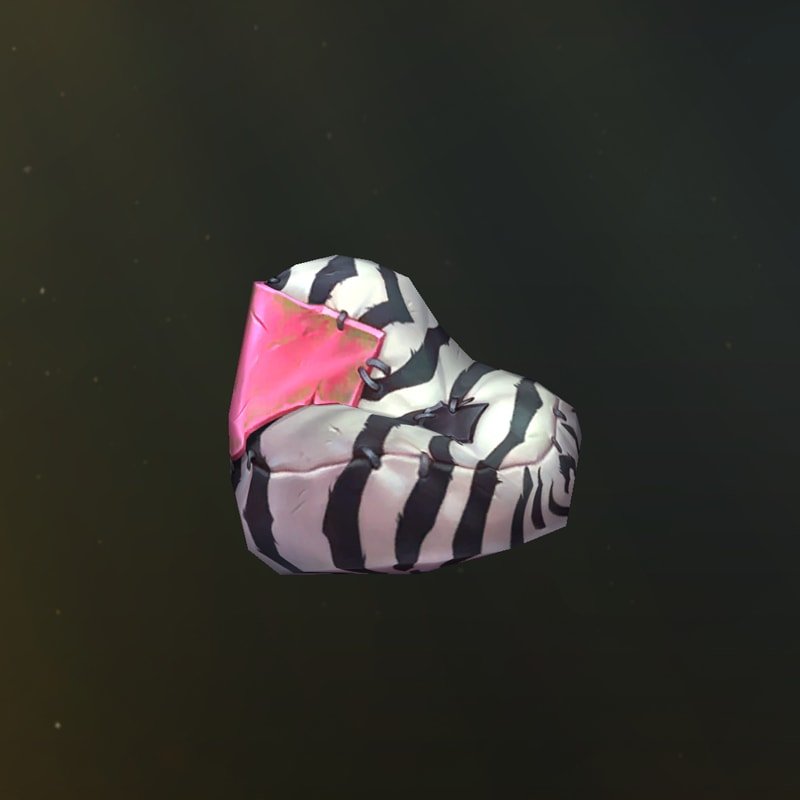 Un asiento puf a rayas negras y blancas